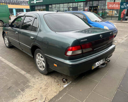 Зелений Ніссан Максіма, об'ємом двигуна 2 л та пробігом 470 тис. км за 1999 $, фото 4 на Automoto.ua