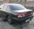 Зеленый Ниссан Максима, объемом двигателя 3 л и пробегом 250 тыс. км за 3700 $, фото 1 на Automoto.ua
