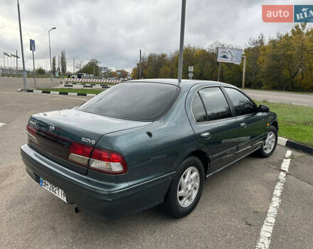 Зеленый Ниссан Максима, объемом двигателя 3 л и пробегом 326 тыс. км за 3700 $, фото 4 на Automoto.ua