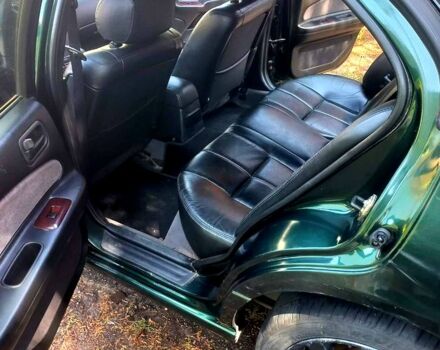 Зеленый Ниссан Максима, объемом двигателя 2 л и пробегом 321 тыс. км за 2200 $, фото 9 на Automoto.ua