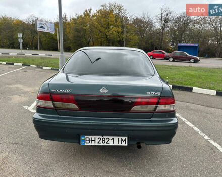 Зеленый Ниссан Максима, объемом двигателя 3 л и пробегом 326 тыс. км за 3700 $, фото 3 на Automoto.ua