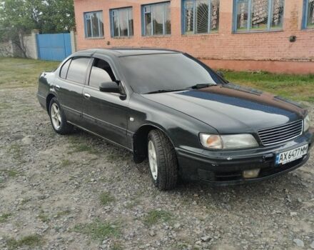 Зеленый Ниссан Максима, объемом двигателя 3 л и пробегом 300 тыс. км за 2600 $, фото 2 на Automoto.ua