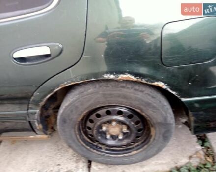 Зелений Ніссан Максіма, об'ємом двигуна 2 л та пробігом 370 тис. км за 2000 $, фото 1 на Automoto.ua