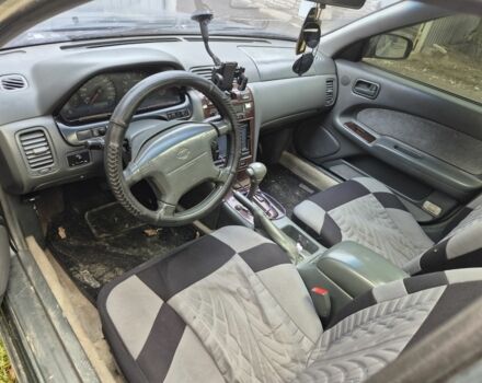 Зеленый Ниссан Максима, объемом двигателя 2 л и пробегом 2 тыс. км за 1400 $, фото 2 на Automoto.ua