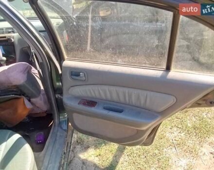 Зеленый Ниссан Максима, объемом двигателя 3 л и пробегом 400 тыс. км за 1200 $, фото 10 на Automoto.ua