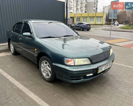 Зелений Ніссан Максіма, об'ємом двигуна 2 л та пробігом 470 тис. км за 1999 $, фото 1 на Automoto.ua