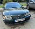 Зеленый Ниссан Максима, объемом двигателя 3 л и пробегом 450 тыс. км за 1856 $, фото 1 на Automoto.ua