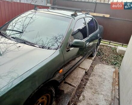 Зелений Ніссан Максіма, об'ємом двигуна 2 л та пробігом 370 тис. км за 2000 $, фото 9 на Automoto.ua