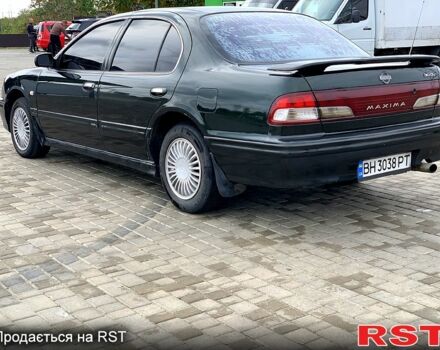 Зелений Ніссан Максіма, об'ємом двигуна 3 л та пробігом 453 тис. км за 2100 $, фото 1 на Automoto.ua