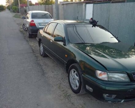 Зеленый Ниссан Максима, объемом двигателя 3 л и пробегом 500 тыс. км за 3000 $, фото 1 на Automoto.ua