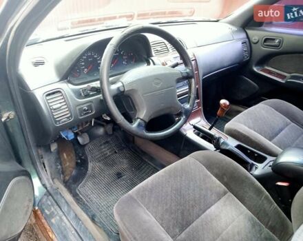 Зелений Ніссан Максіма, об'ємом двигуна 2 л та пробігом 370 тис. км за 2000 $, фото 2 на Automoto.ua