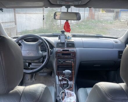 Зеленый Ниссан Максима, объемом двигателя 3 л и пробегом 258 тыс. км за 2450 $, фото 5 на Automoto.ua