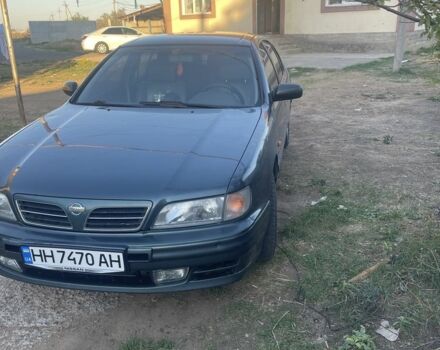 Зеленый Ниссан Максима, объемом двигателя 3 л и пробегом 258 тыс. км за 2450 $, фото 3 на Automoto.ua