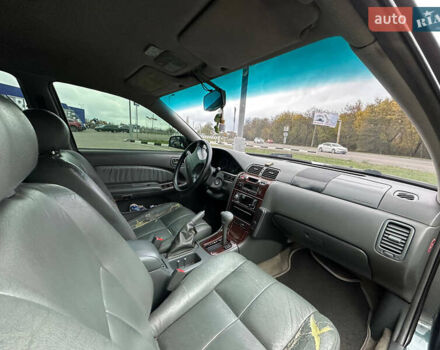 Зеленый Ниссан Максима, объемом двигателя 3 л и пробегом 326 тыс. км за 3700 $, фото 9 на Automoto.ua