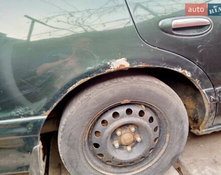 Зелений Ніссан Максіма, об'ємом двигуна 2 л та пробігом 370 тис. км за 2000 $, фото 4 на Automoto.ua