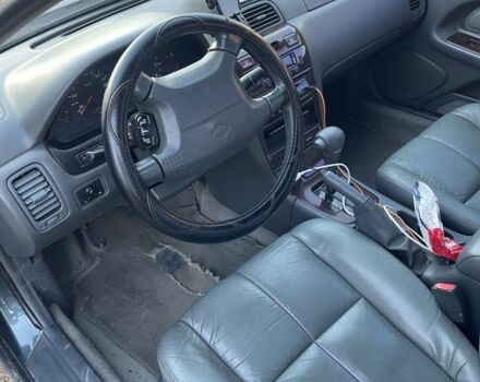 Зеленый Ниссан Максима, объемом двигателя 3 л и пробегом 258 тыс. км за 2450 $, фото 6 на Automoto.ua