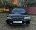 Зеленый Ниссан Максима, объемом двигателя 2 л и пробегом 238 тыс. км за 2699 $, фото 1 на Automoto.ua
