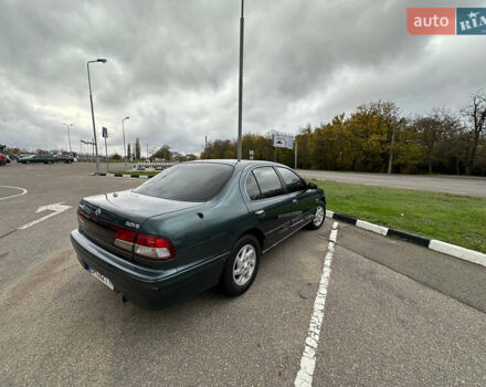 Зеленый Ниссан Максима, объемом двигателя 3 л и пробегом 326 тыс. км за 3700 $, фото 5 на Automoto.ua