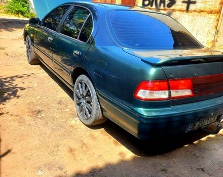 Зеленый Ниссан Максима, объемом двигателя 2 л и пробегом 321 тыс. км за 2200 $, фото 3 на Automoto.ua