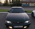 Зеленый Ниссан Максима, объемом двигателя 2 л и пробегом 377 тыс. км за 3500 $, фото 10 на Automoto.ua