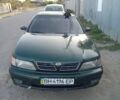 Зеленый Ниссан Максима, объемом двигателя 3 л и пробегом 500 тыс. км за 3000 $, фото 1 на Automoto.ua