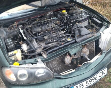 Зелений Ніссан Максіма, об'ємом двигуна 3 л та пробігом 444 тис. км за 1111 $, фото 5 на Automoto.ua