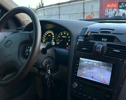 Зелений Ніссан Максіма, об'ємом двигуна 3 л та пробігом 487 тис. км за 3900 $, фото 26 на Automoto.ua