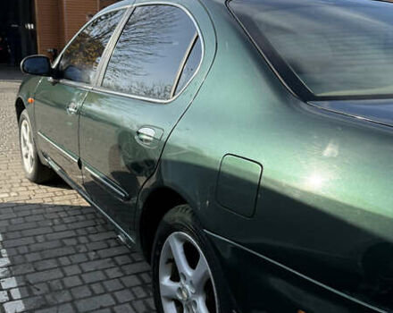 Зеленый Ниссан Максима, объемом двигателя 2 л и пробегом 560 тыс. км за 4000 $, фото 10 на Automoto.ua