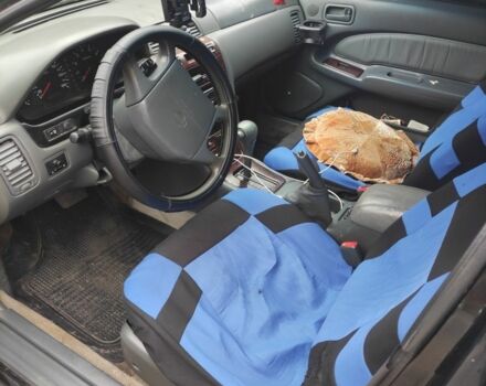 Зеленый Ниссан Максима, объемом двигателя 3 л и пробегом 427 тыс. км за 2100 $, фото 2 на Automoto.ua