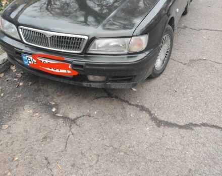 Зеленый Ниссан Максима, объемом двигателя 3 л и пробегом 427 тыс. км за 2100 $, фото 1 на Automoto.ua