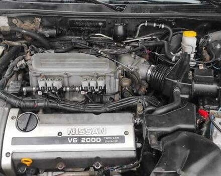 Зеленый Ниссан Максима, объемом двигателя 2 л и пробегом 450 тыс. км за 2300 $, фото 1 на Automoto.ua