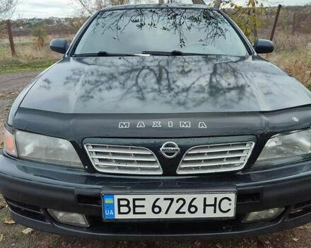 Зеленый Ниссан Максима, объемом двигателя 2 л и пробегом 381 тыс. км за 1300 $, фото 1 на Automoto.ua