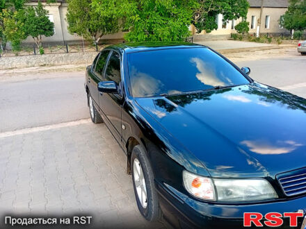 Зеленый Ниссан Максима, объемом двигателя 3 л и пробегом 395 тыс. км за 3800 $, фото 1 на Automoto.ua