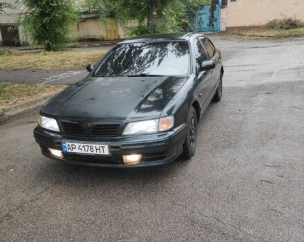 Зеленый Ниссан Максима, объемом двигателя 2 л и пробегом 300 тыс. км за 1350 $, фото 1 на Automoto.ua