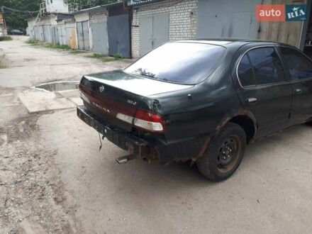 Зеленый Ниссан Максима, объемом двигателя 3 л и пробегом 327 тыс. км за 1670 $, фото 1 на Automoto.ua