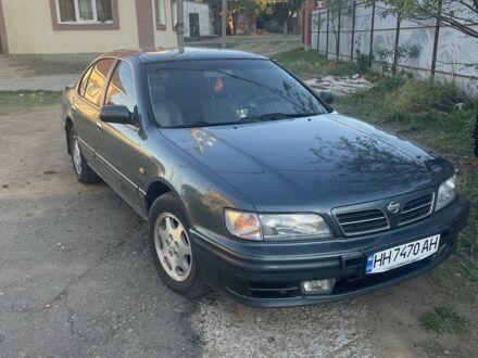 Зеленый Ниссан Максима, объемом двигателя 3 л и пробегом 258 тыс. км за 2450 $, фото 1 на Automoto.ua