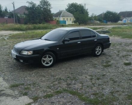 Зеленый Ниссан Максима, объемом двигателя 3 л и пробегом 300 тыс. км за 2600 $, фото 1 на Automoto.ua