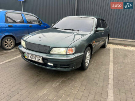 Зеленый Ниссан Максима, объемом двигателя 2 л и пробегом 470 тыс. км за 1999 $, фото 1 на Automoto.ua