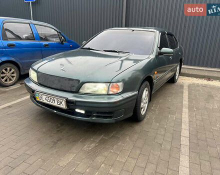 Зелений Ніссан Максіма, об'ємом двигуна 2 л та пробігом 470 тис. км за 1999 $, фото 1 на Automoto.ua