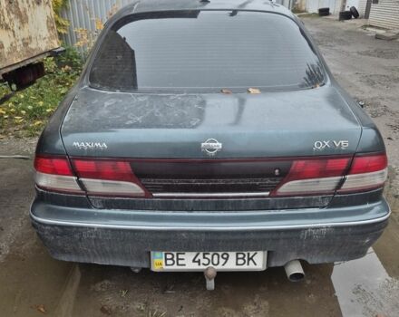 Зеленый Ниссан Максима, объемом двигателя 2 л и пробегом 2 тыс. км за 1400 $, фото 1 на Automoto.ua