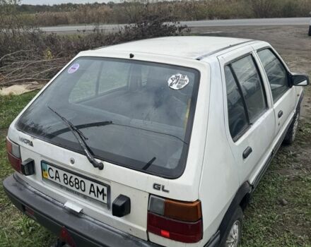 Білий Ніссан Мікра, об'ємом двигуна 1 л та пробігом 200 тис. км за 384 $, фото 3 на Automoto.ua