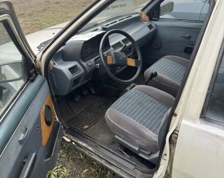 Білий Ніссан Мікра, об'ємом двигуна 1 л та пробігом 200 тис. км за 384 $, фото 1 на Automoto.ua