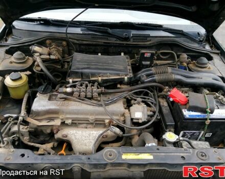 Чорний Ніссан Мікра, об'ємом двигуна 1 л та пробігом 220 тис. км за 1550 $, фото 6 на Automoto.ua