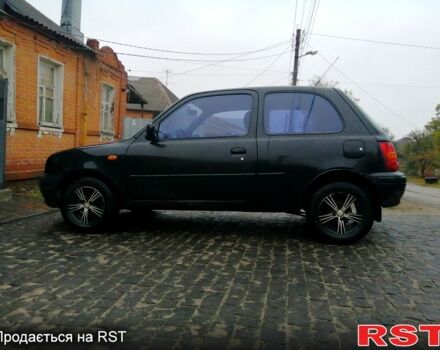 Чорний Ніссан Мікра, об'ємом двигуна 1 л та пробігом 220 тис. км за 1550 $, фото 4 на Automoto.ua