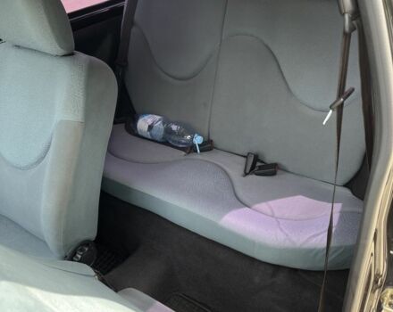 Черный Ниссан Микра, объемом двигателя 1 л и пробегом 260 тыс. км за 2800 $, фото 5 на Automoto.ua