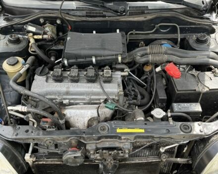 Черный Ниссан Микра, объемом двигателя 1 л и пробегом 260 тыс. км за 2800 $, фото 7 на Automoto.ua