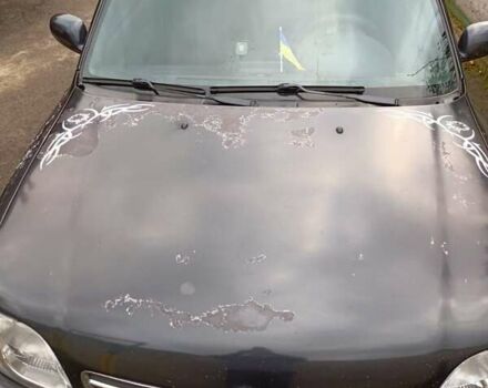 Чорний Ніссан Мікра, об'ємом двигуна 1 л та пробігом 188 тис. км за 2200 $, фото 7 на Automoto.ua