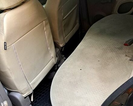 Черный Ниссан Микра, объемом двигателя 1.2 л и пробегом 170 тыс. км за 4000 $, фото 6 на Automoto.ua