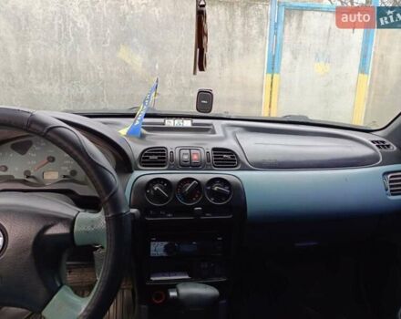 Чорний Ніссан Мікра, об'ємом двигуна 1 л та пробігом 188 тис. км за 2200 $, фото 9 на Automoto.ua