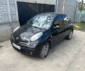 Черный Ниссан Микра, объемом двигателя 1.4 л и пробегом 170 тыс. км за 4996 $, фото 1 на Automoto.ua
